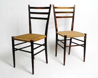 A pair of beautiful Mid Century Italian wooden dining chairs with wicker cord seats