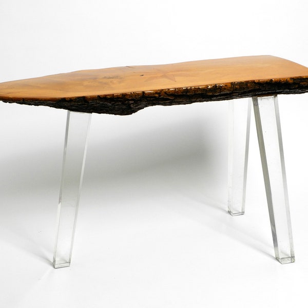 Beautiful 1970s Regency design side coffee table made of a thick tree slice and with 3 plexiglass legs