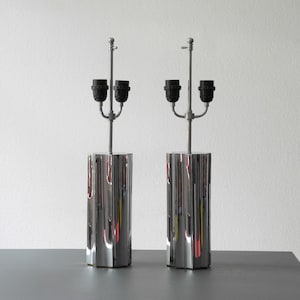 Two big beautiful 60s chrome table lamp bases feet. Very nice design and high quality. Solid metal with chrome.
