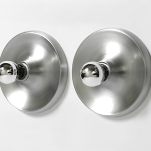 Two 1960s round Space Age Pop Art aluminum ceiling or wall lamps