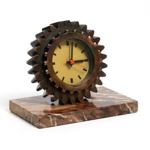 Beautiful 70s heavy table clock made of an iron gear and a marble base