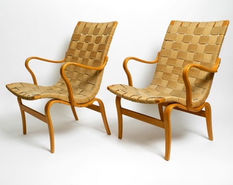 Paire de fauteuils originaux du milieu du siècle modèle "Eva" de Bruno Mathsson en bouleau et tissage de chanvre | Fabriqué en Suède