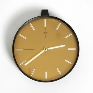 Beautiful very elegant heavy Mid Century Kienzle wall clock made of bronze and brass