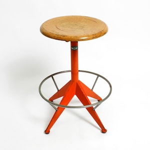 Rare solid Italian Mid Century Industrial metal stool by Mautren in rare orange | with height-adjustable seat
