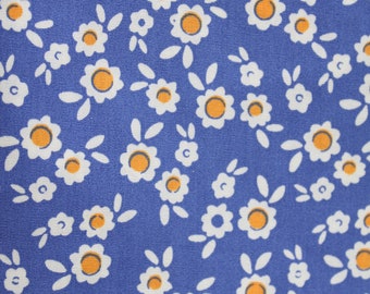 Fabric daisies blue background