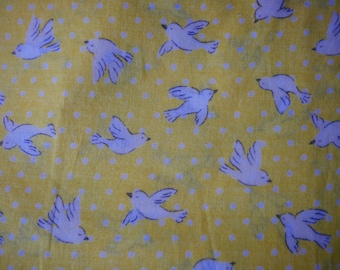 Retro bird fabric on a lemon yellow background