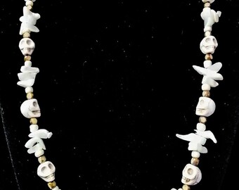 20 1/2" Carved howlite skull, mother of pearl & czech glass bead necklace