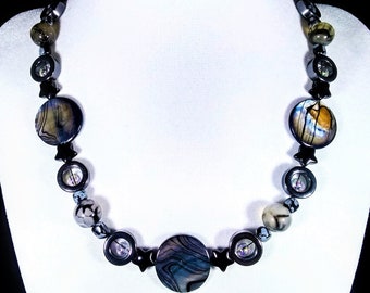 17 1/2" Genuine hematite, snowflake obsidian, fire agate, shell & artglass bead necklace