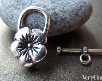 10 set di chiusure a levetta a forma di fiore in argento anticato 13 x 20 mm A1264
