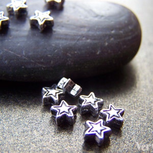 50 Star Spacer Beads Antique Silver 5x6.5mm A1070