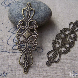 20 pcs of Antique Bronze Filigree Flower Embellishments  20x65mm A2665