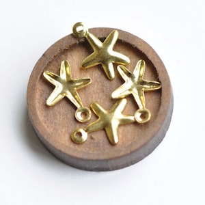 Gold Starfish Charms Embellishments 8x11mm Set of 50 A8350