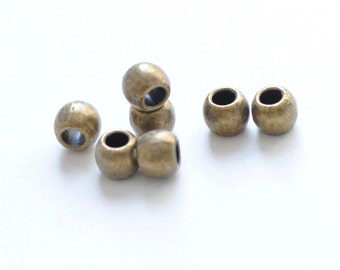 50 pcs of Antique Bronze Round Smooth Spacer Beads 6x7mm A6189