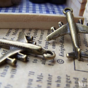 10 pcs of Antique Bronze Jet Plane Charms 23x28mm A939