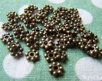 50 pcs of Antique Bronze Daisy Flower Spacer Beads 4.5mm A3404