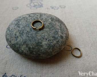 550 pcs of Antique Bronze Split Rings 7mm 25gauge A5657