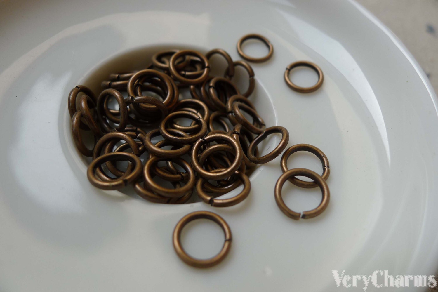 18 Gauge Antique Copper Jump Rings - 8mm OD, Saw-Cut, 200 Pack (1 Oz) | Made In USA