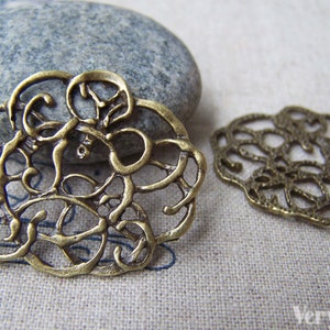 10 pcs of Antique Bronze Filigree Swirly Charms 29x33mm A3430