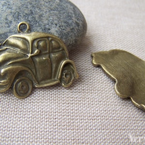 10 pcs of Antique Bronze Car Charms Pendants 22x38mm A632