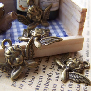 20 pcs of Antique Bronze Lovely Angel Charms 11x20mm A726