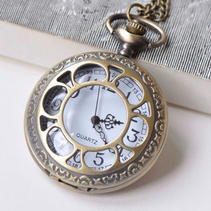 Grande montre de poche ronde en filigrane, bronze antique, lot de 1 A1617