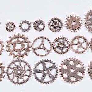 May include: Assortment of 15 copper-coloured metal gears of various sizes and designs. The gears have a distressed finish and are perfect for crafting projects.
