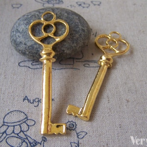 10 Stück Gold Farbe Skelett Schlüssel Anhänger 20x62mm A4301