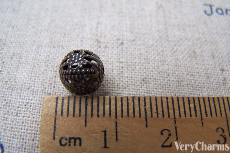 50 pcs of Antique Bronze Filigree Ball Spacer Beads Size 8mm A1972 image 3