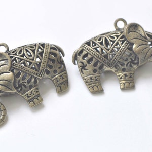 2 pcs Antique Bronze Filigree 3D Elephant Pendants 33x53mm A8924