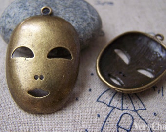 6 pcs of Antique Bronze Halloween Mask Charms 26x40mm A716