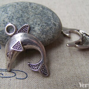 10 pcs of Antique Silver Lovely Dolphin Charms 24mm A3027