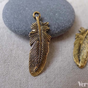 Feather Charms Antiqued Gold Bird Wings 10x28mm Set of 30 pcs A7367