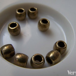 50 pcs of Antique Bronze Round Smooth Spacer Beads 5x6mm A5714 imagem 2