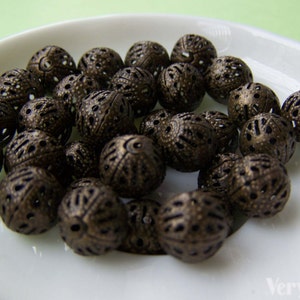 50 pcs of Antique Bronze Filigree Ball Spacer Beads Size 10mm A1976