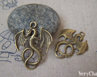 10 pcs of Antique Bronze Flying Dragon Charms Pendants 27x34mm A5143