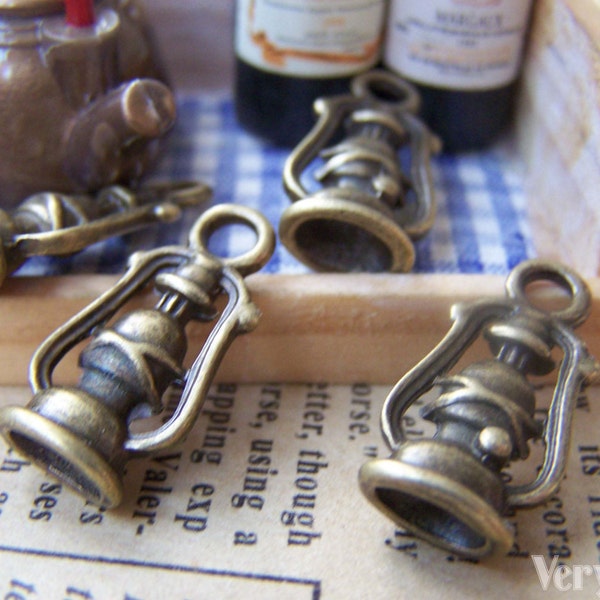 10 pcs of Antique Bronze Oil Hurricane Lamp Charms 10x20mm A1451