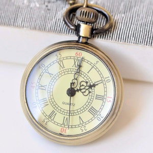 1 montre de poche bronze antique à double chiffre A5002