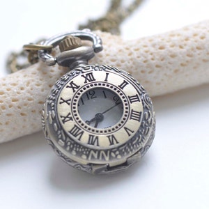 1-delig antiek bronzen zakhorloge met kleine ronde deksel 27 mm A7684