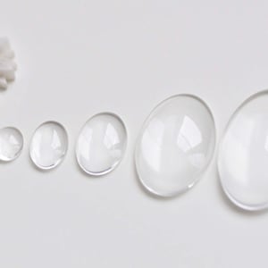 Ovale cabochoncabines van kristalglas met platte achterkant 8 x 10 mm/10 x 14 mm/13 x 18 mm/18 x 25 mm/22 x 30 mm/25 x 35 mm/30 x 40 mm/48 x 61 mm