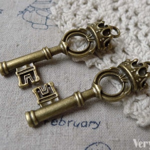 Filigree Key 10 Pcs of Antique Bronze Filigree Crown Key Pendants Charms 15x54mm ...