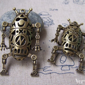 2 pcs of Antique Bronze Filigree Robot Pendant Double Sided 32x58mm A730