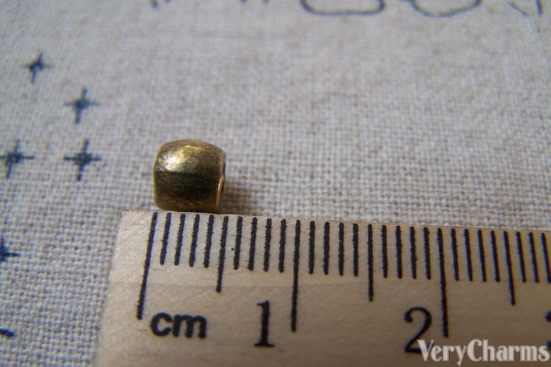 50 pcs of Antique Bronze Round Smooth Spacer Beads 5x6mm A5714 imagem 3