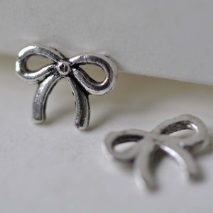 50 st. antik silver fluga knutberlocker 8 x 10 mm A7806