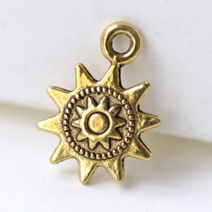 Antika guld solberlocker 12 x 17 mm dubbelsidiga set med 30 A8239