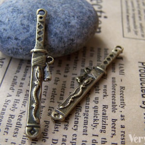 20 pcs of Antique Bronze Chinese Dragon Sword Charms Pendants Double Sided 7x43mm A1123