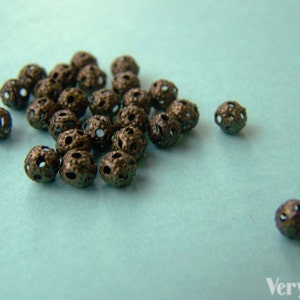 300 pcs of Antique Bronze Filigree Ball Spacer Beads Size 4mm A1978 image 1