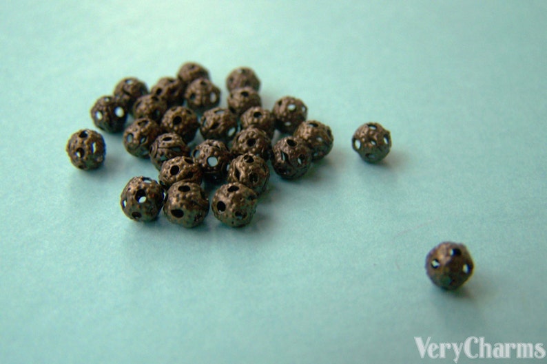 300 pcs of Antique Bronze Filigree Ball Spacer Beads Size 4mm A1978 image 1