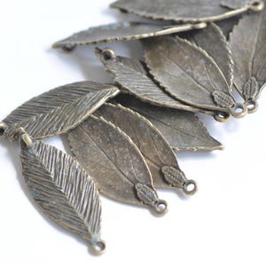 Antik Bronze Blatt Charms Schmuck Zubehör 13 x 35 mm 10er Set A5284