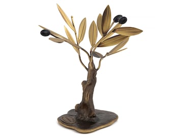May include: A gold metal olive tree sculpture with black olives. The tree has a textured, gnarled trunk and a base with the inscription "Olive Branch of Peace".