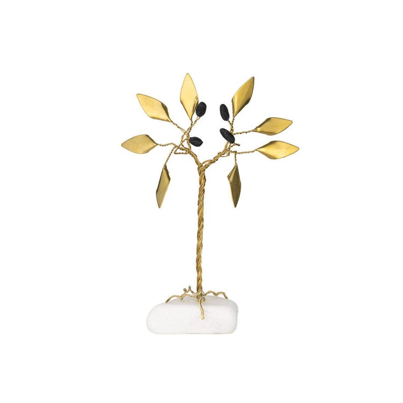 May include: A decorative metal tree sculpture with gold-colored leaves and a twisted trunk. The tree features small black accents and is mounted on a white stone base. The sculpture is a unique home decor item.